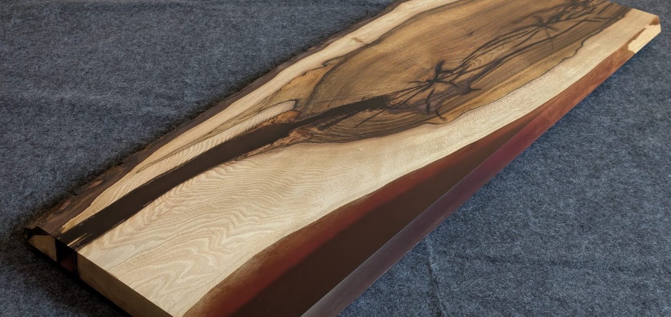 Drift II walnut and resin table by INSIGNI