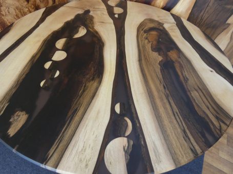 Eclipse Walnut and resin dining table